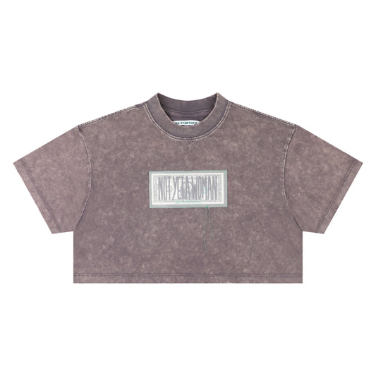 “NOT YET A WOMAN” DOLLAR CROP TEE WASHED PURPLE